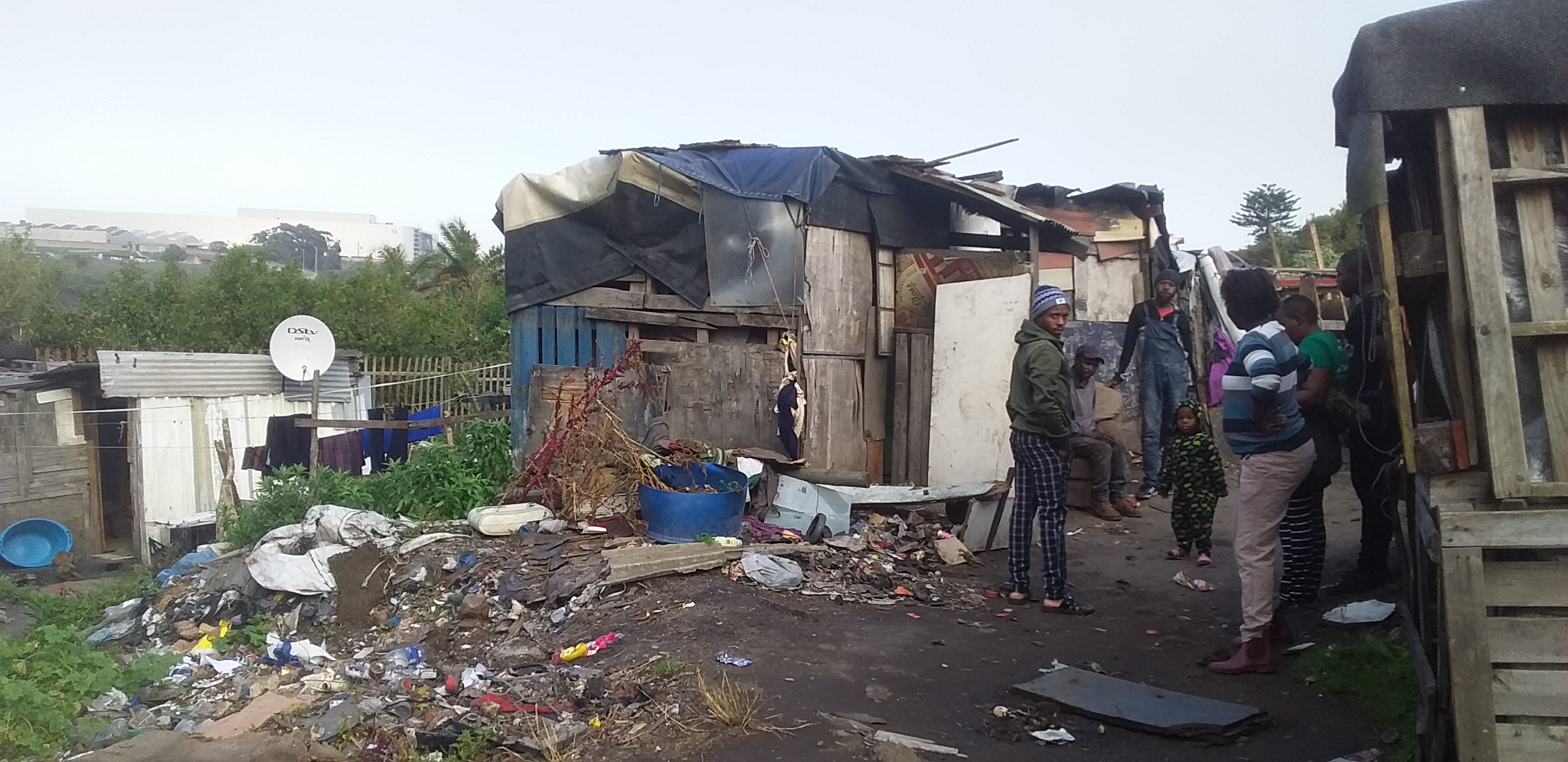 More than 20 families share one pit toilet in this East London